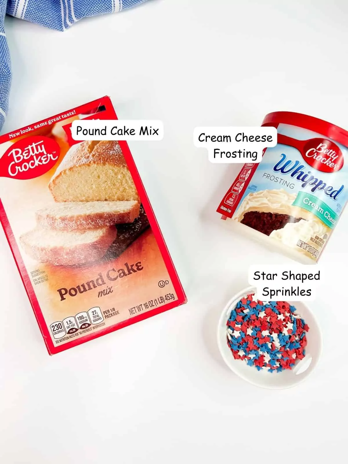 ingredients boxed cake mix, canned cream cheese frosting and star shaped sprinkles.