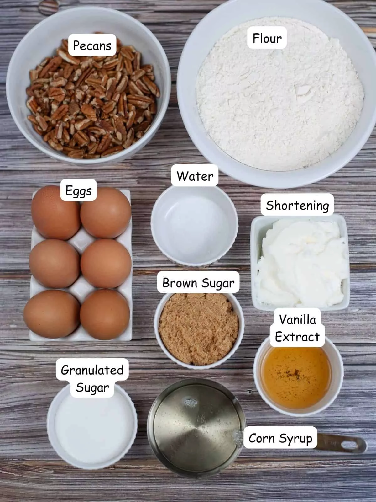 ingredients in bowls for pecan pie tarts.