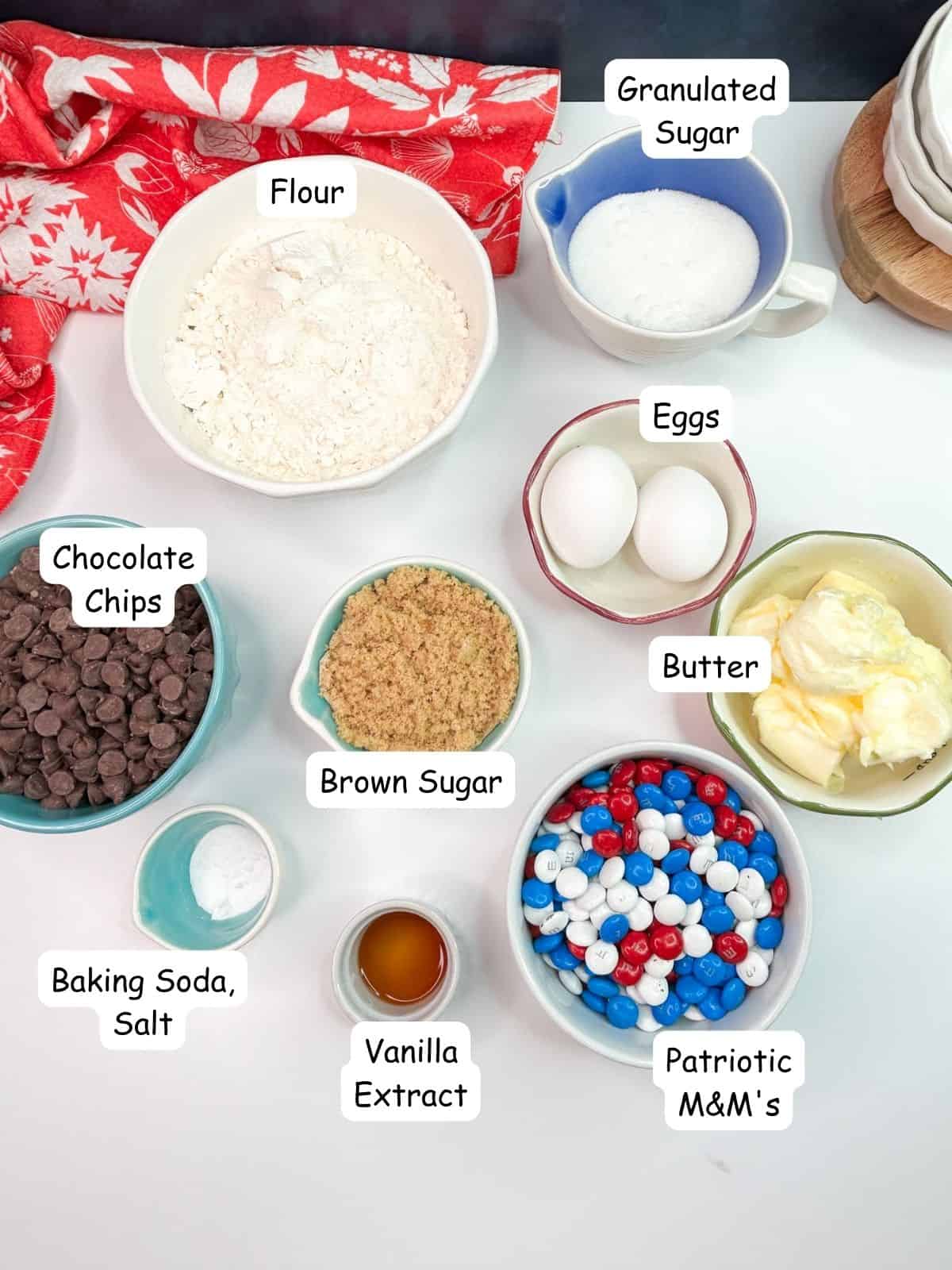 Ingredients for chocolate chip cookies and patriotic M&Ms.