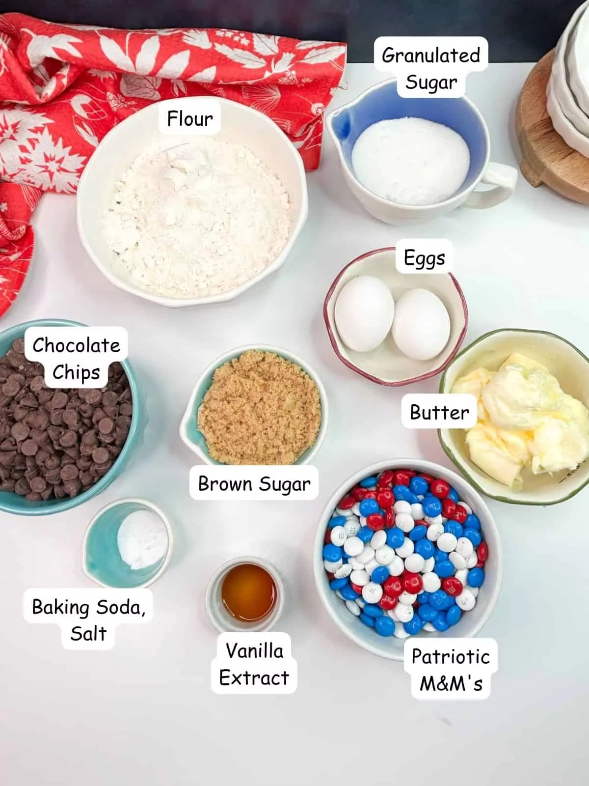 Ingredients for chocolate chip cookies and patriotic M&Ms.