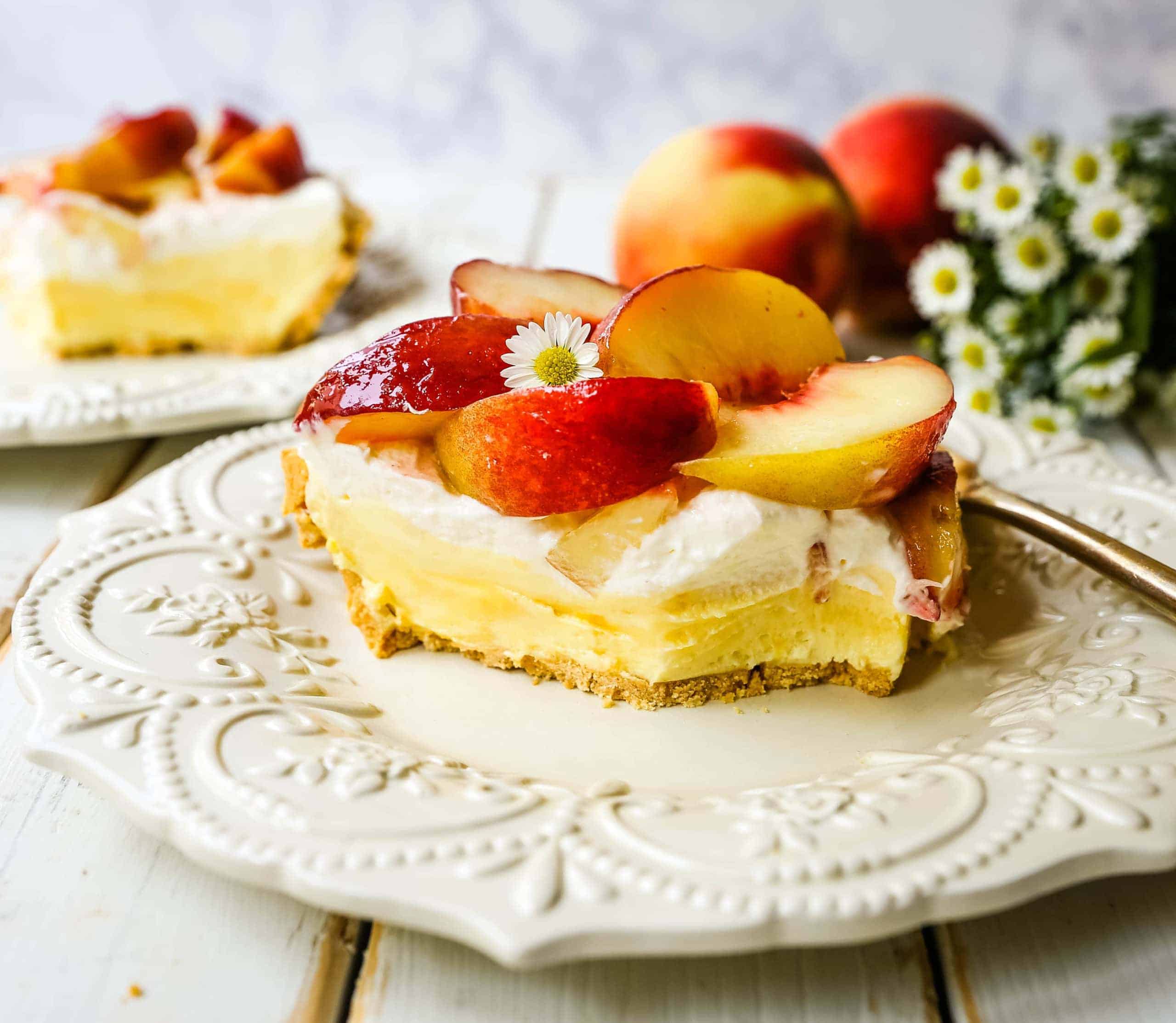 peach cream pie on white plate.