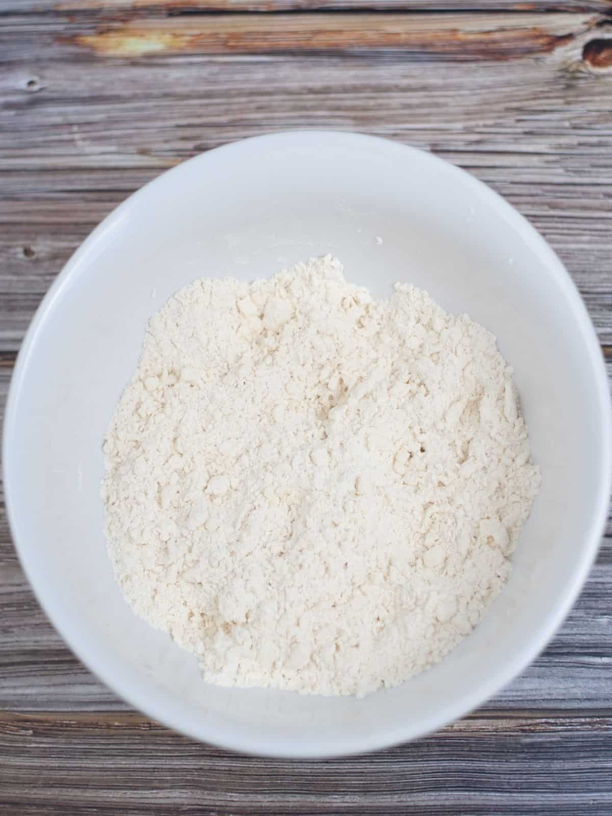flour in white mixing bowl.