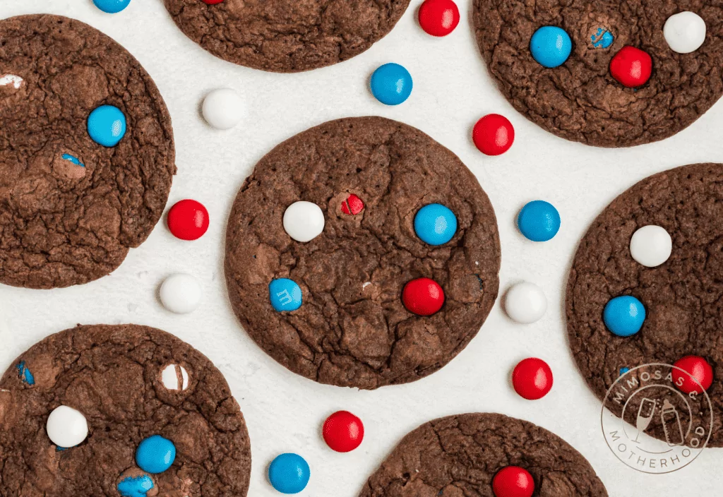 chocolate cookies with red, white and blue candy pieces.