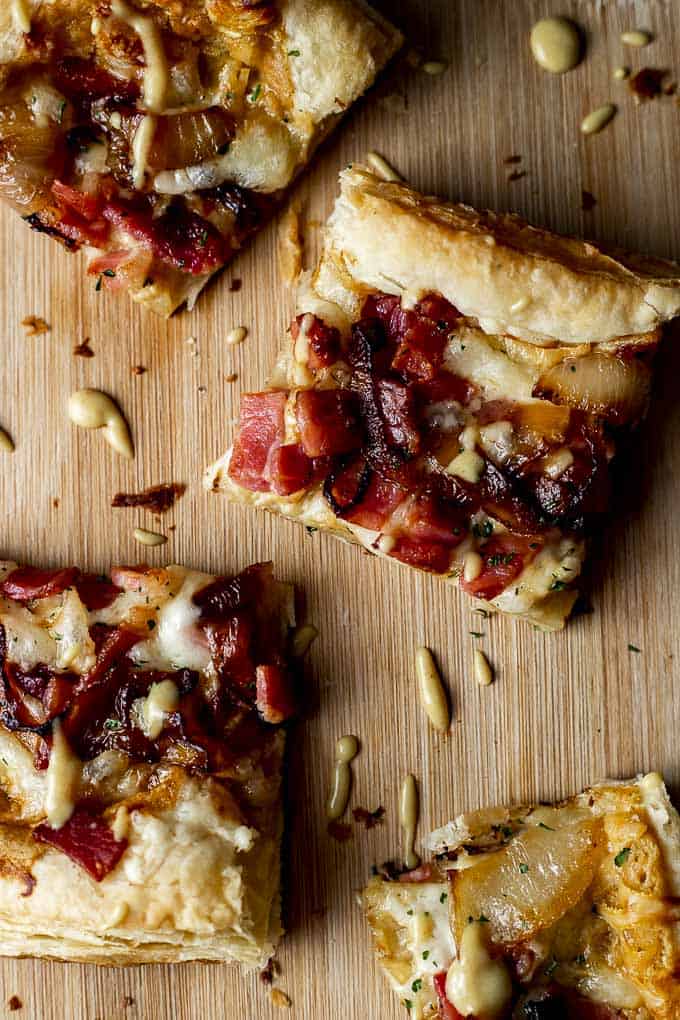 ham and cheese on top of puff pastry.