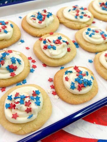 red, white and blue star sprinkle cookies on tray.