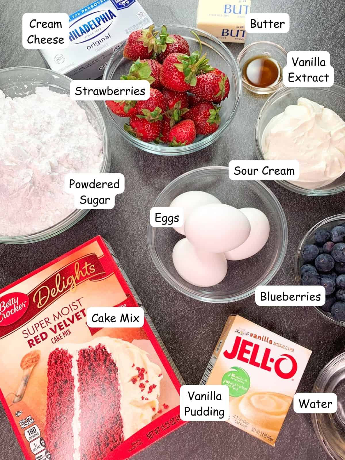 Ingredients for red cake with fruit and cream cheese frosting.