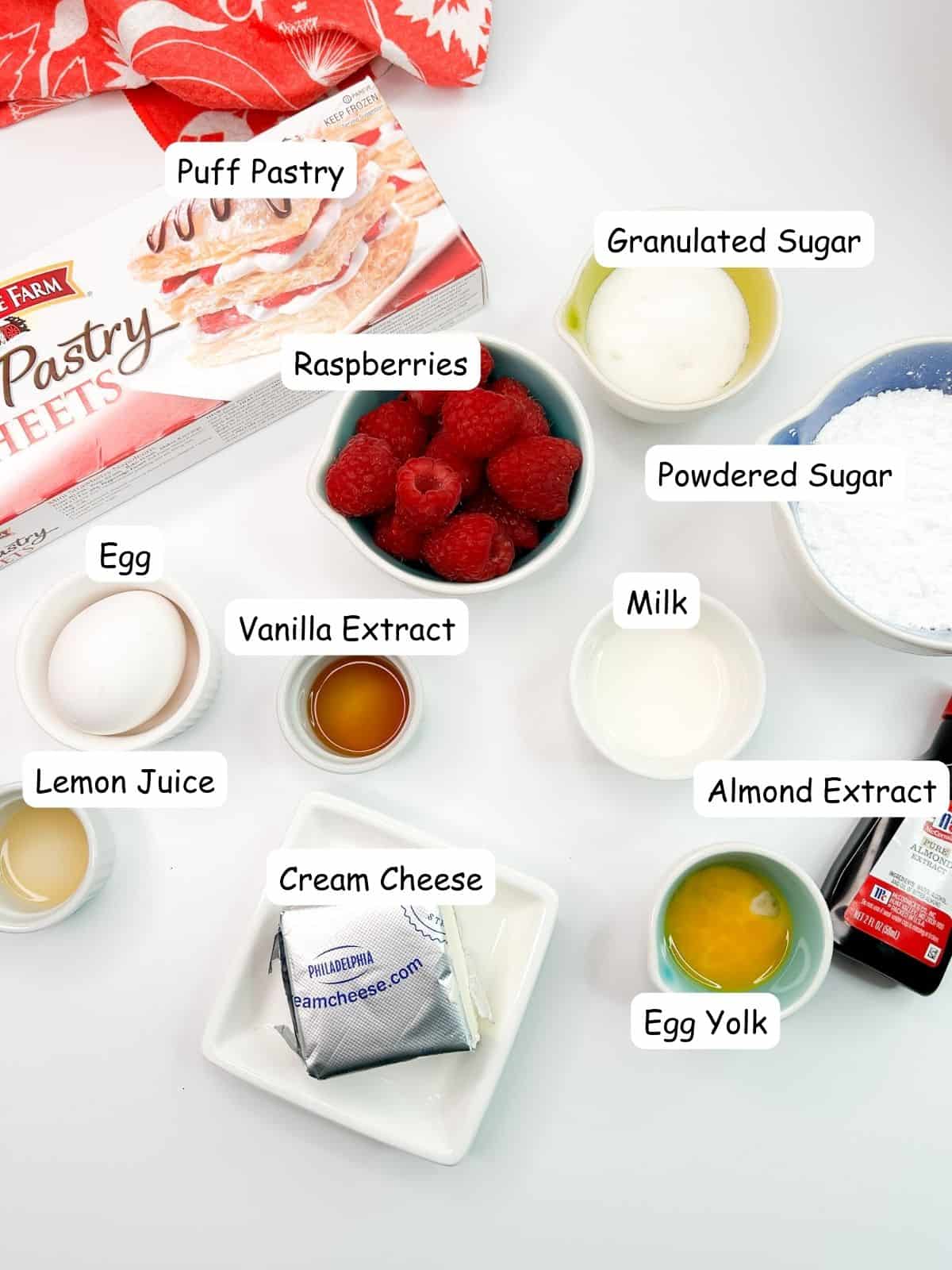 ingredients for homemade danish recipe made with cream cheese and fresh raspberries.