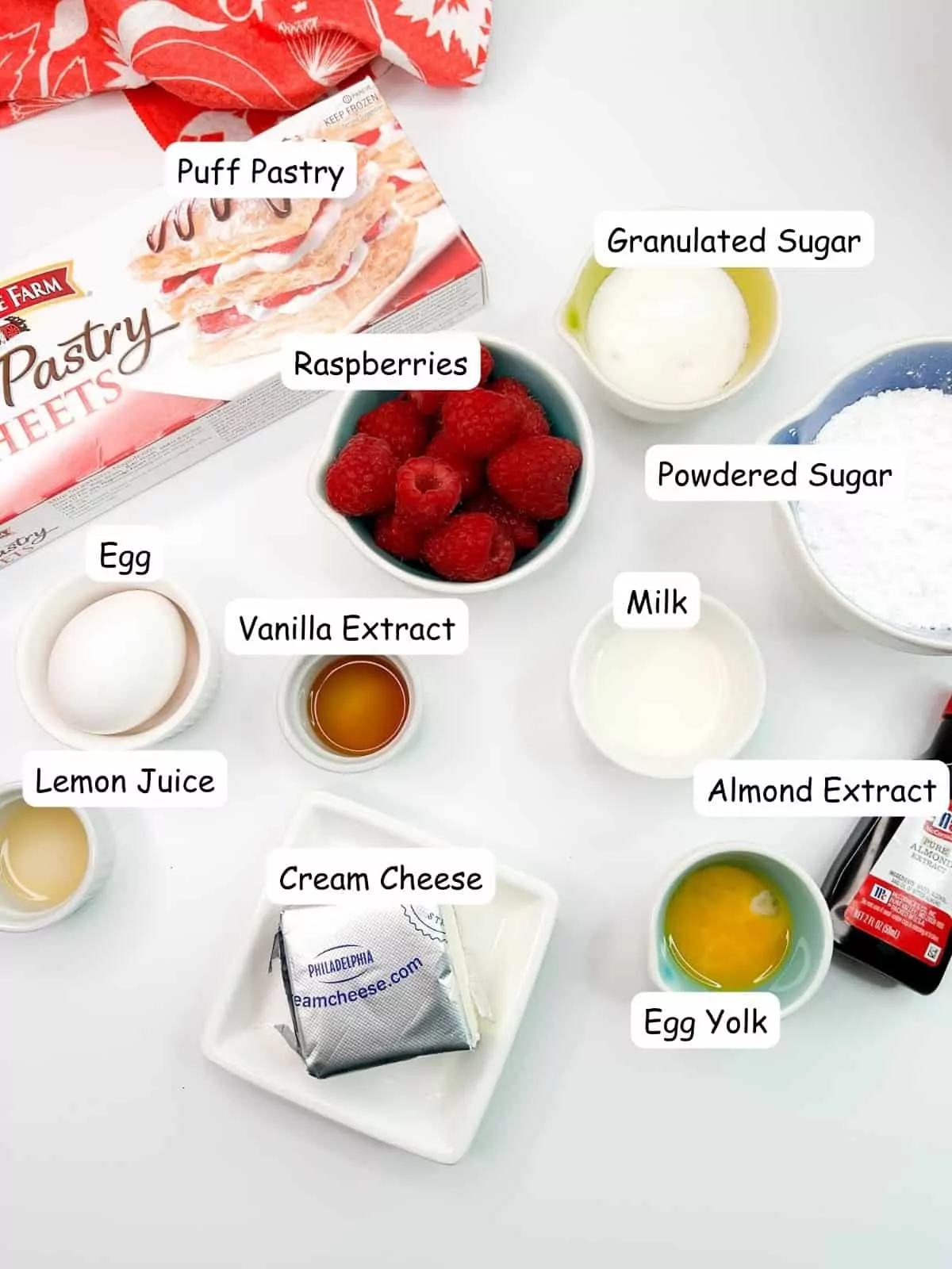 ingredients for homemade danish recipe made with cream cheese and fresh raspberries.