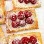 Fresh rasberries with sweetened cream cheese on puff pastry Danish recipe.
