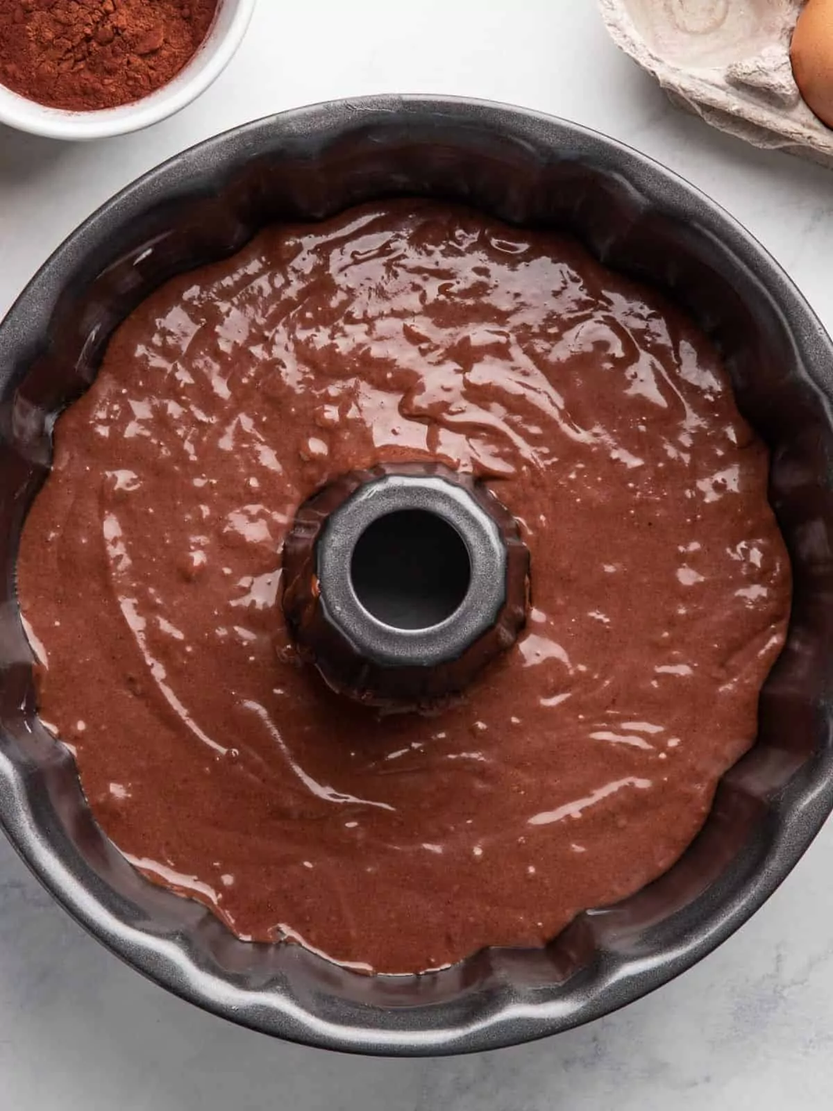 chocolate batter in bundt cake pan.