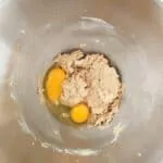 eggs, brown sugar and granulated sugar in mixing bowl.