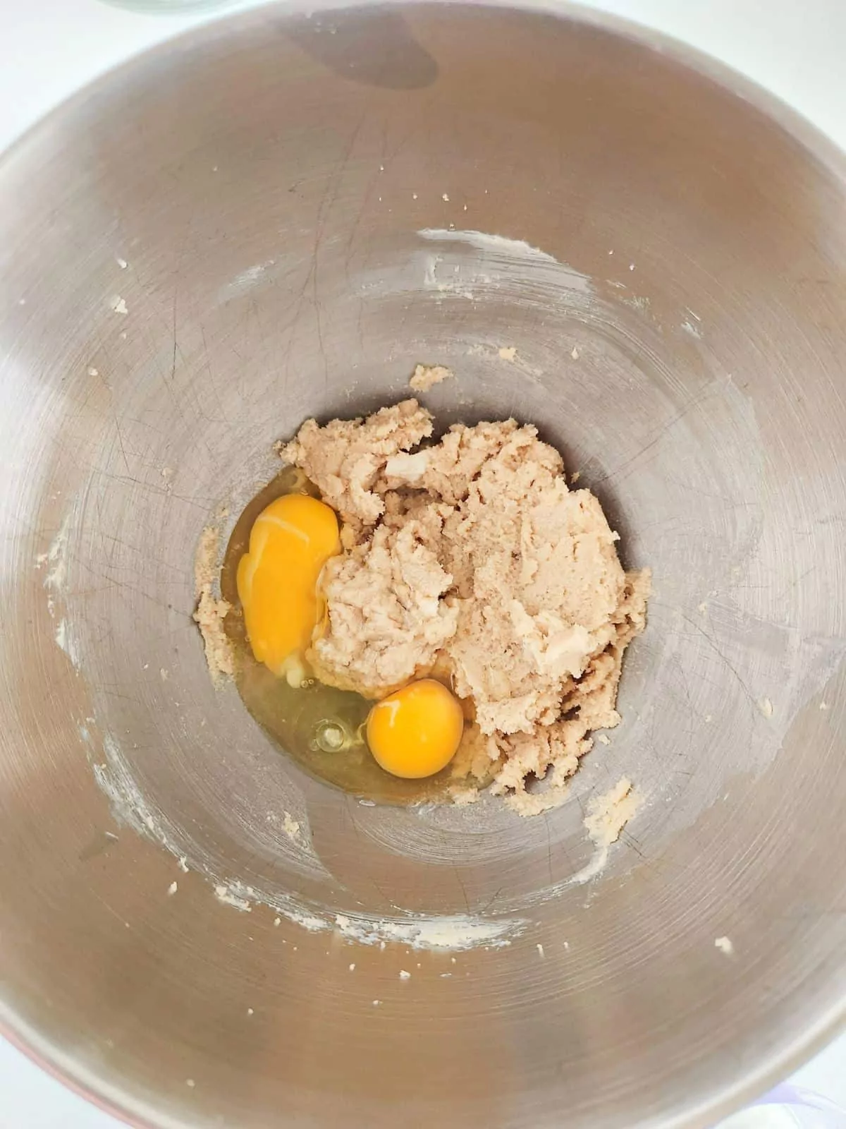eggs, brown sugar and granulated sugar in mixing bowl.