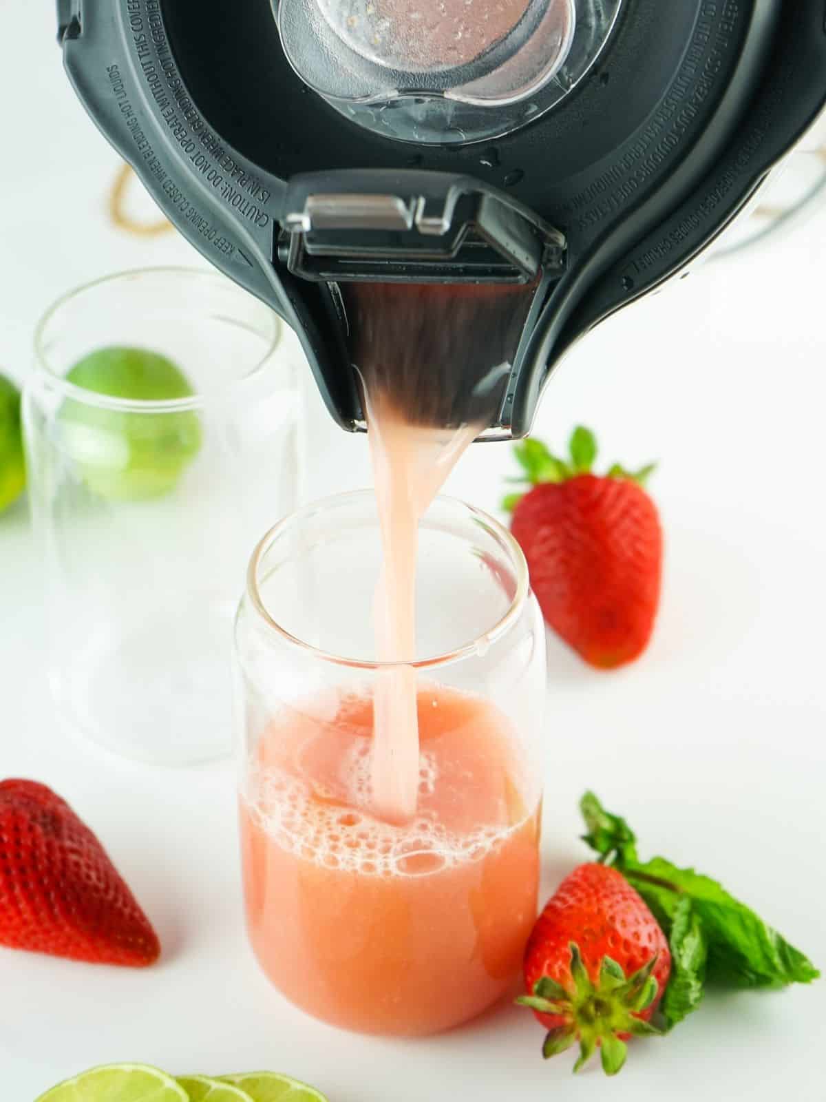 pour freshly blended juice into glass.