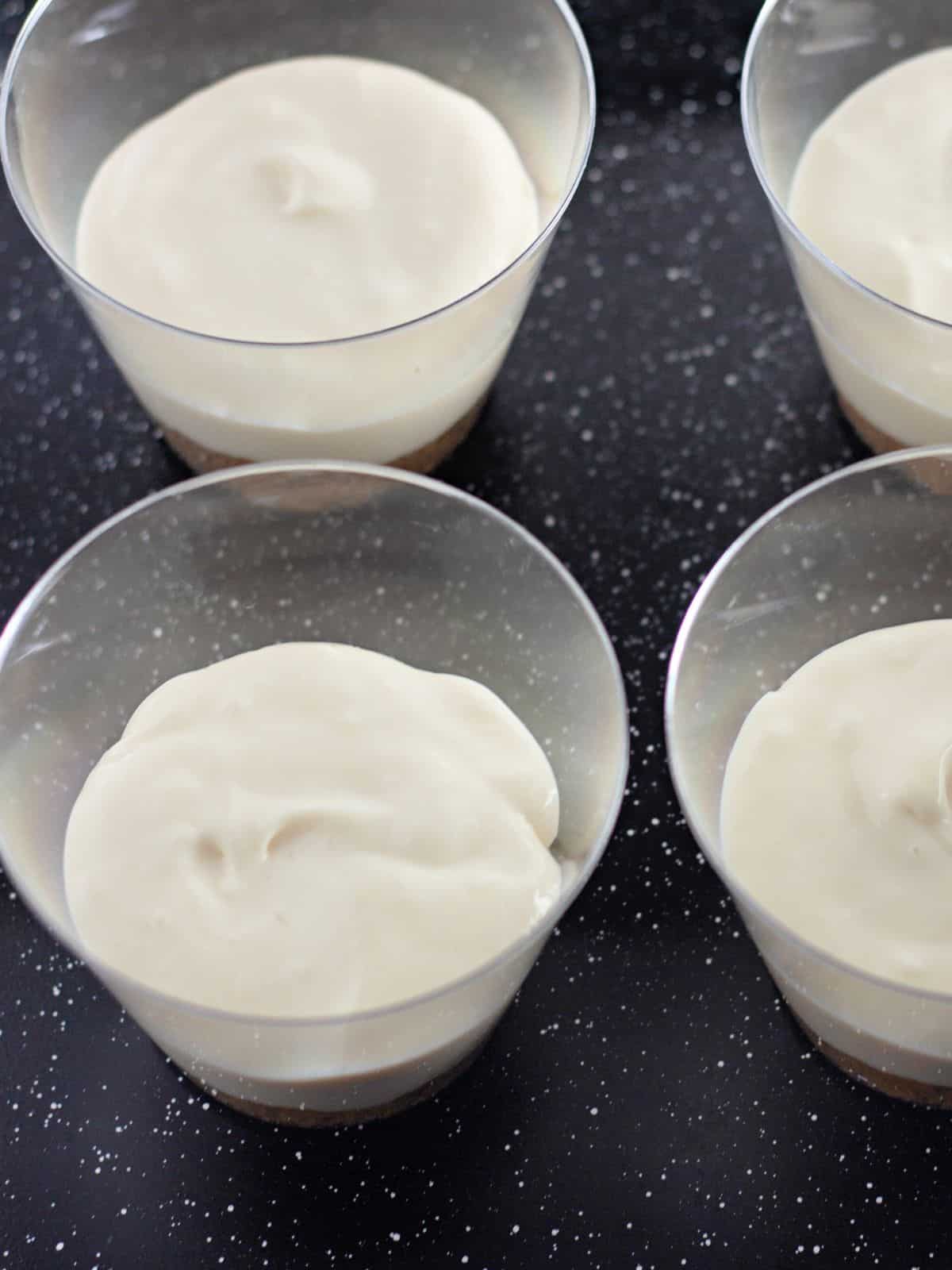 cheesecake mixture in cups.