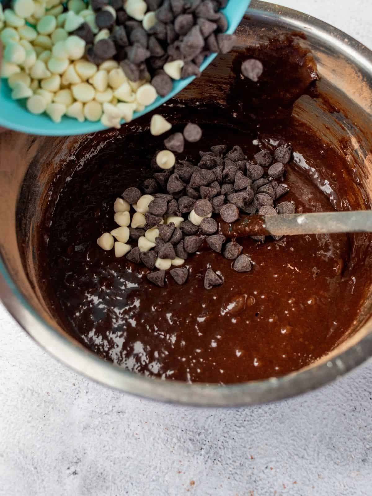 White and semi-sweet chocolate chips to brownie batter.