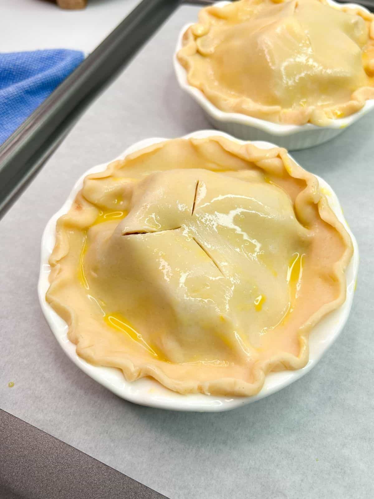 Brush unbaked apple pie with egg mixture.