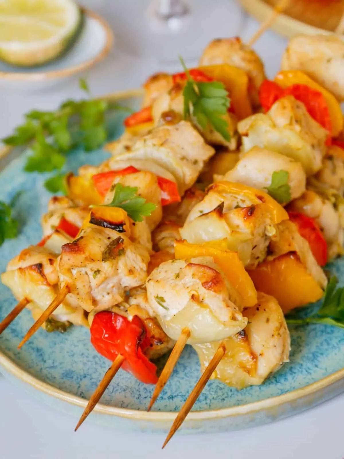 closeup of grilled chicken kabobs.