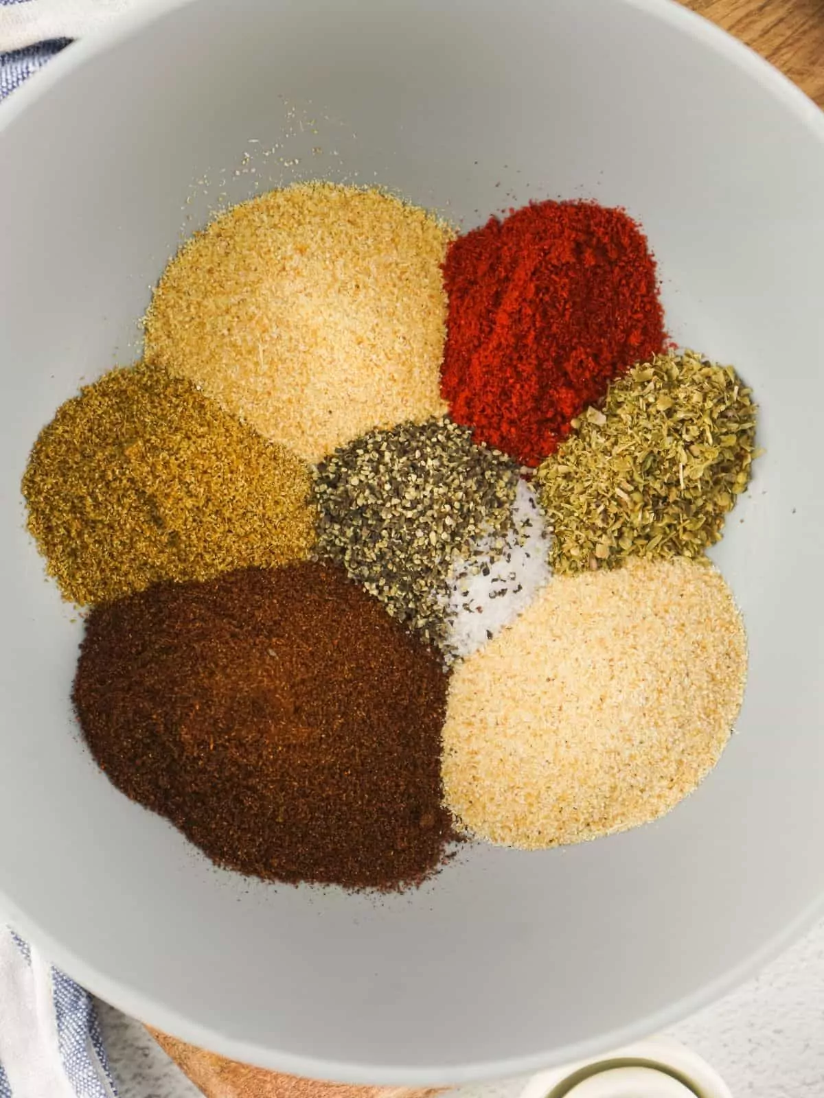 Ingredients for seasoning mix in bowl.