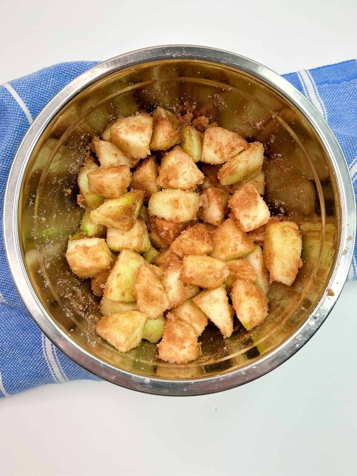 chunks of apples with cinnamon sugar mixture.