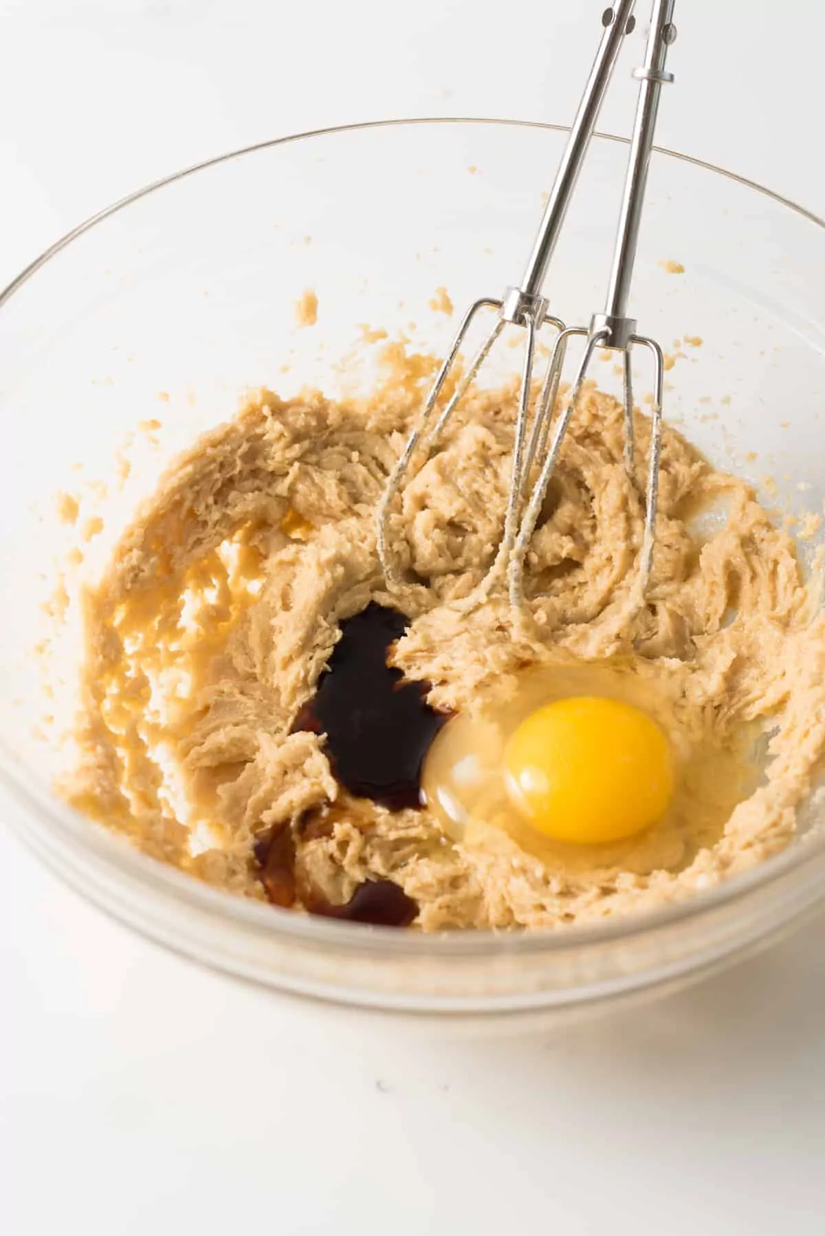Butter, Swerve brown sugar, eggs and vanilla in glass mixing bowl.