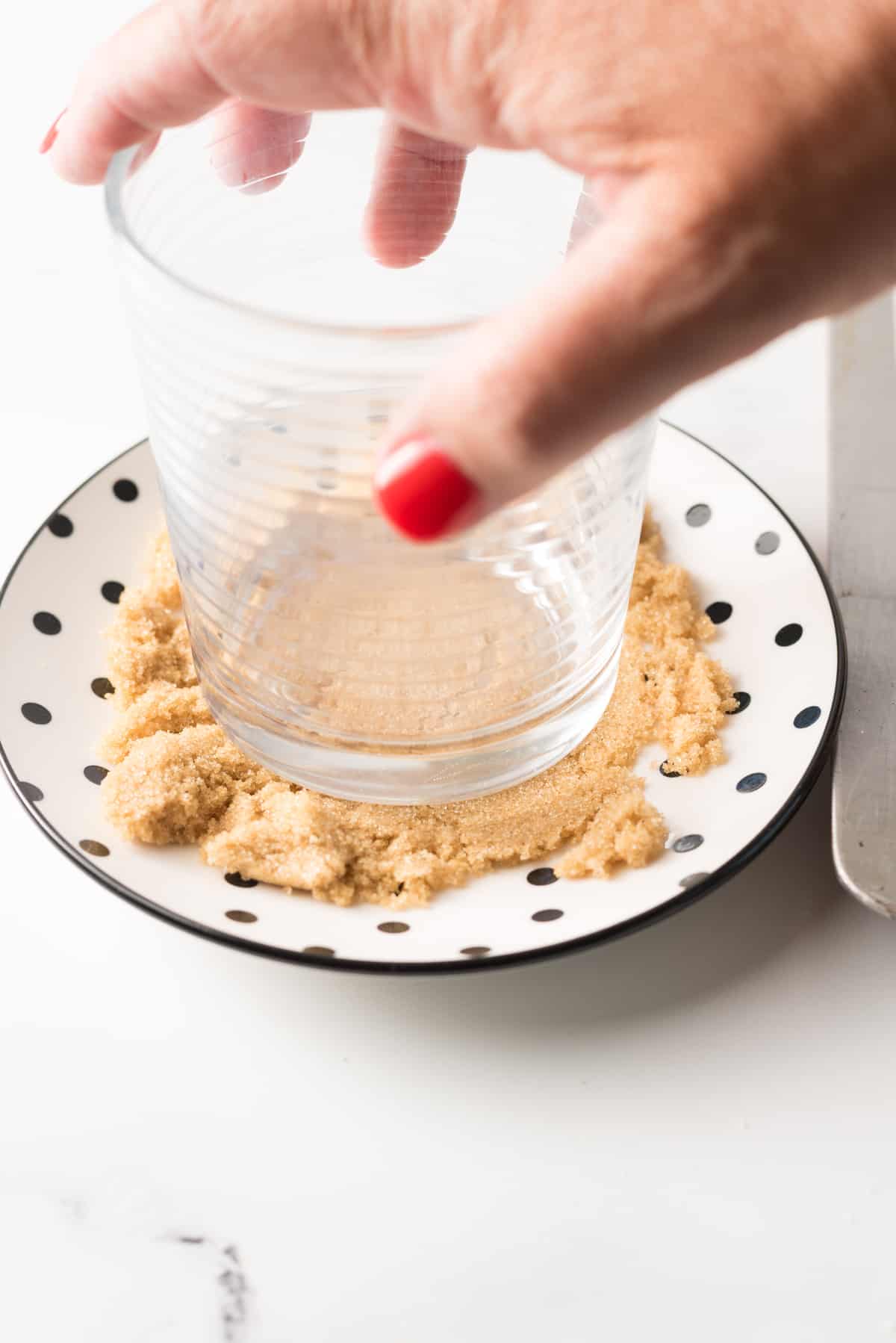 Dip juice glass in sugar free brown sugar.