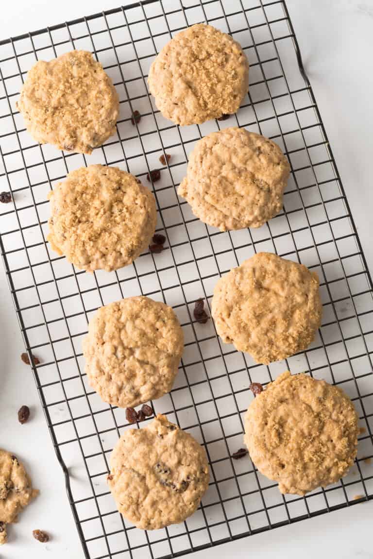 Simple Oatmeal cookie recipe made for diabetics with brown sugar substitute and raisins on cooling rack.
