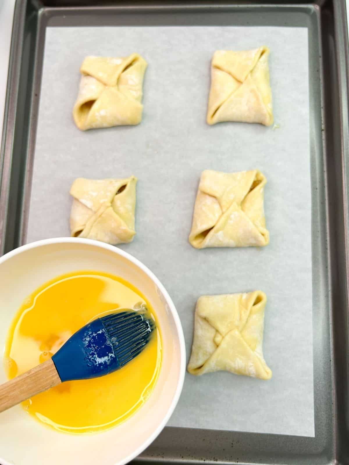 apple danish puff pastry on baking tray