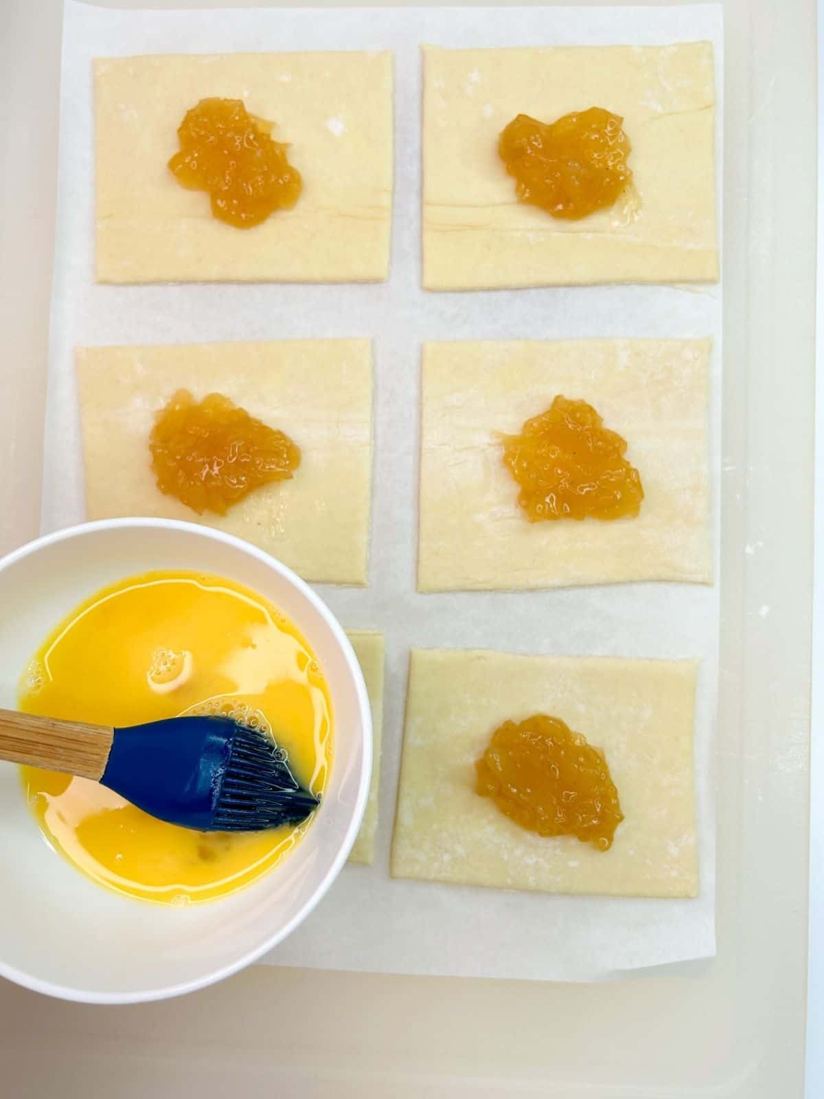 edges of puff pastry brushed with beaten egg.