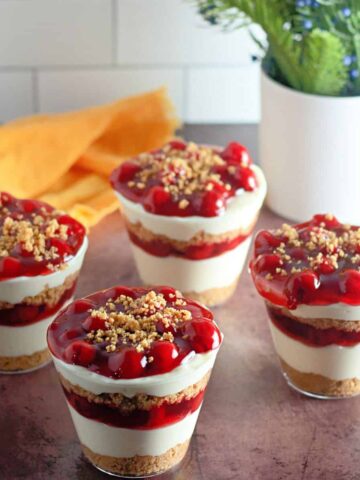 cherry cheesecake pudding in cups.