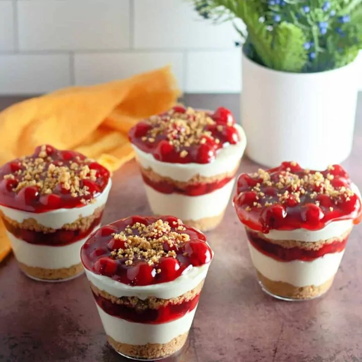 cherry cheesecake pudding in cups.
