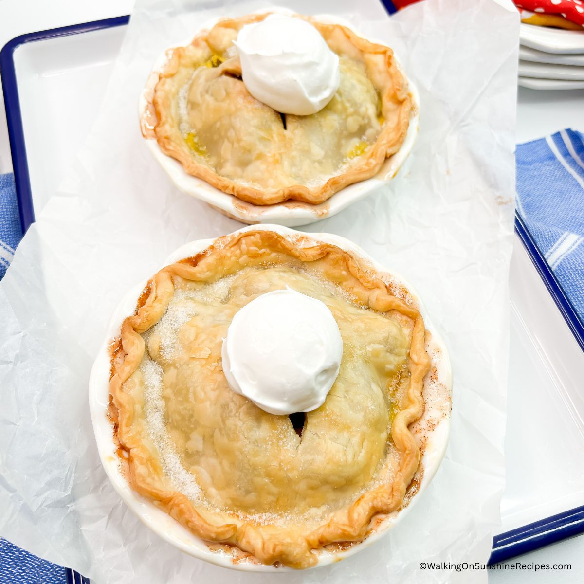 homemade apple pie for two on white tray.