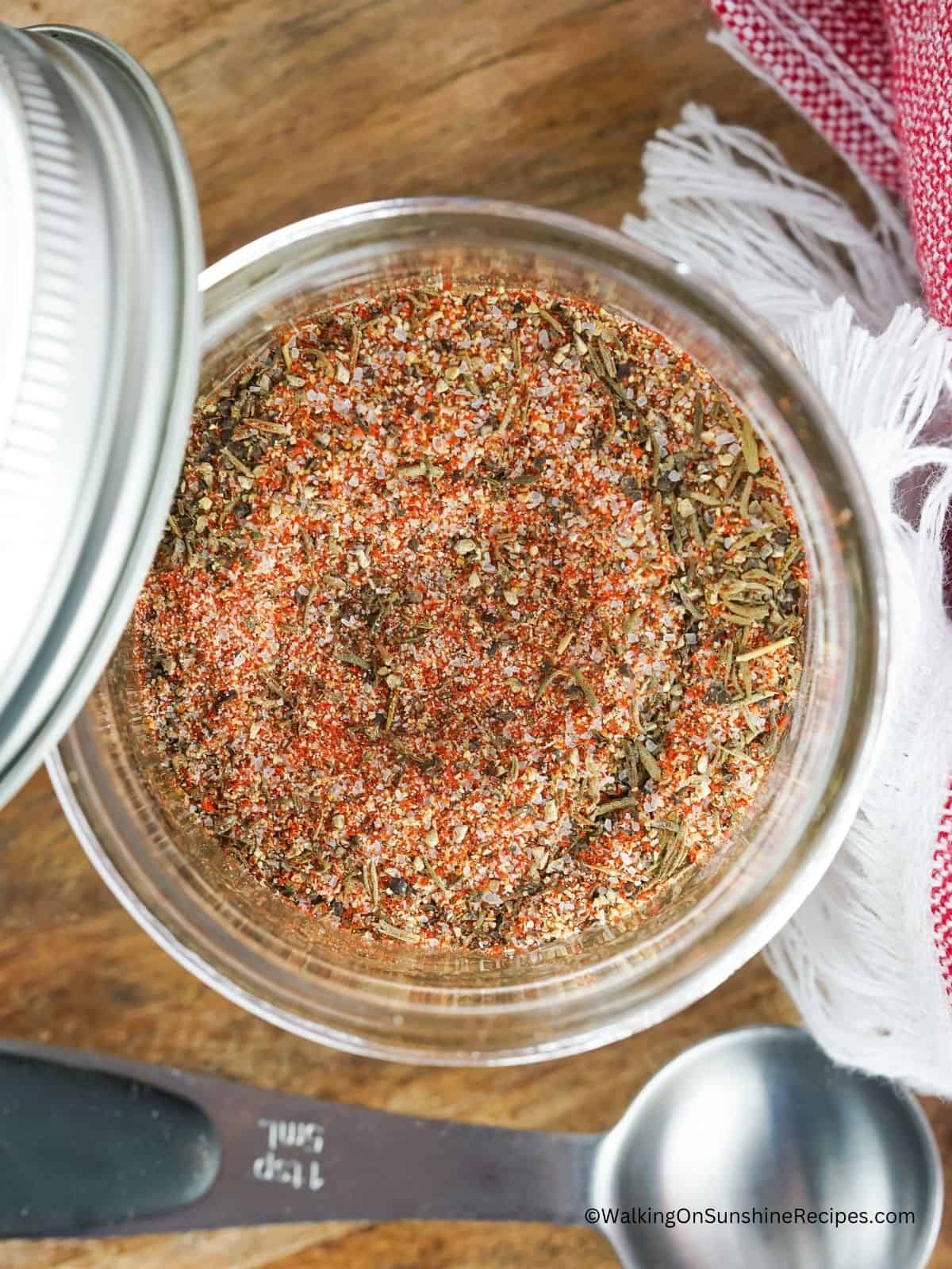 Mason jar without lid with homemade steak seasoning mix.