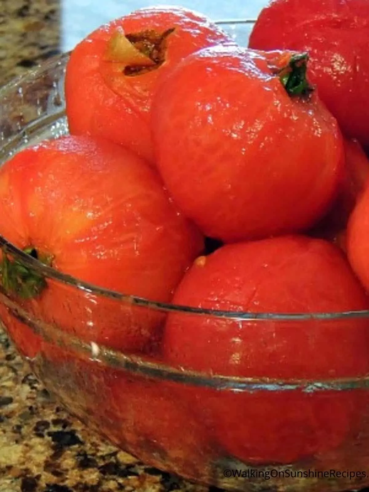 bowl of peeled tomatoes.