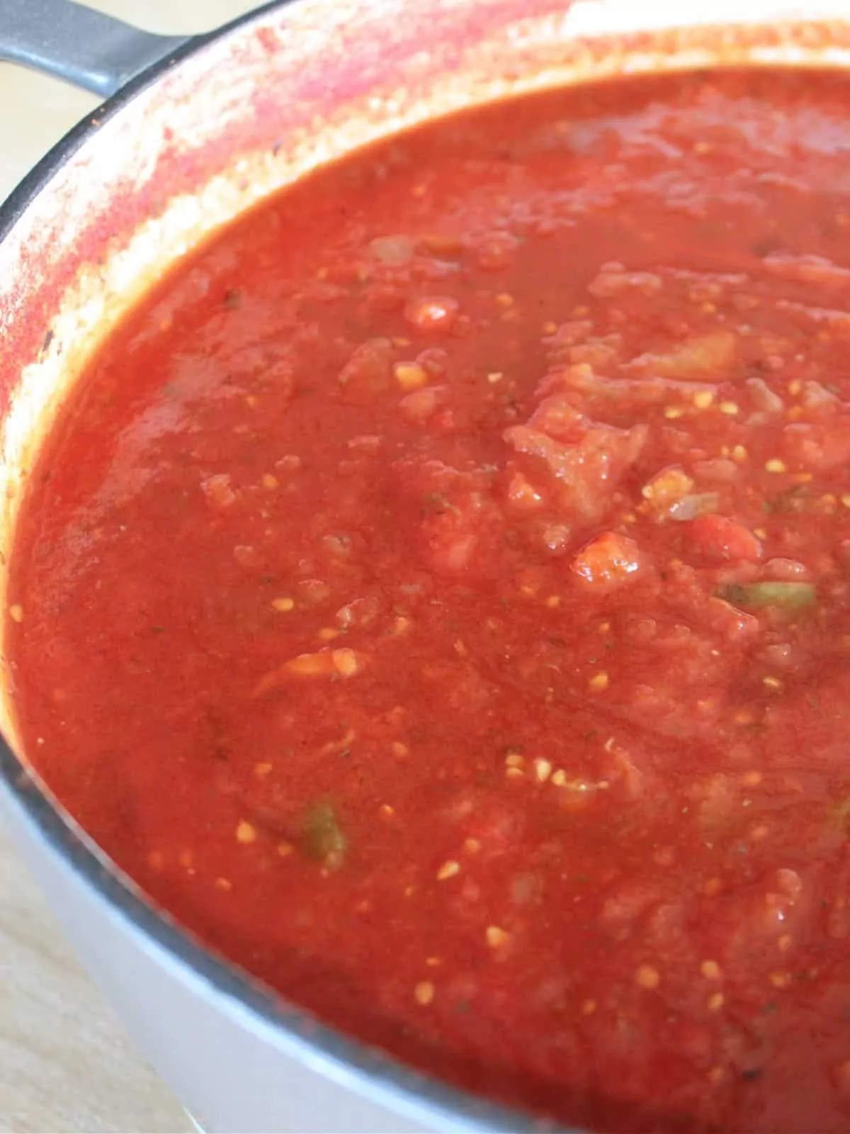 tomato sauce cooked in stock pot.