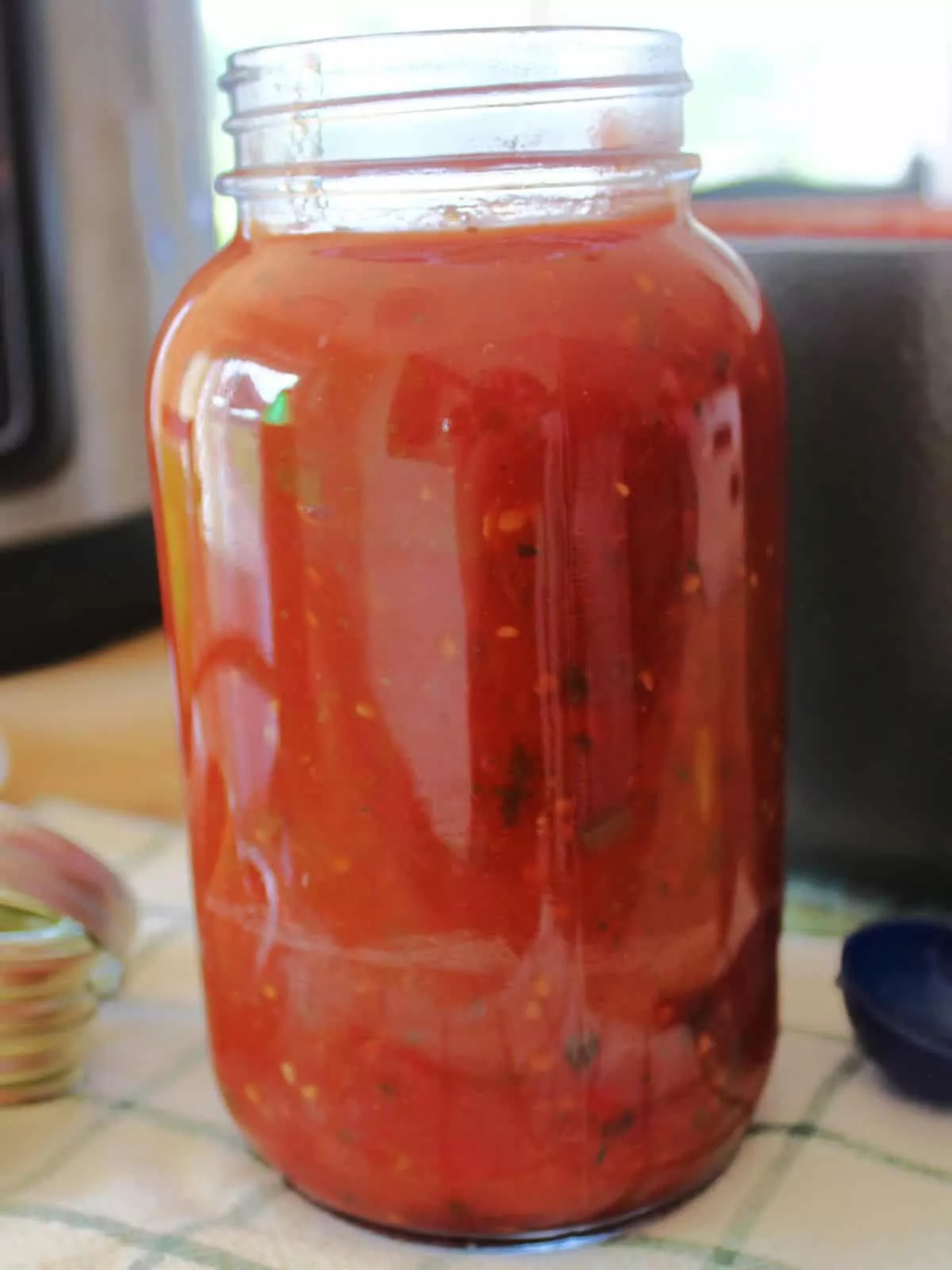 tomato sauce in mason jar.