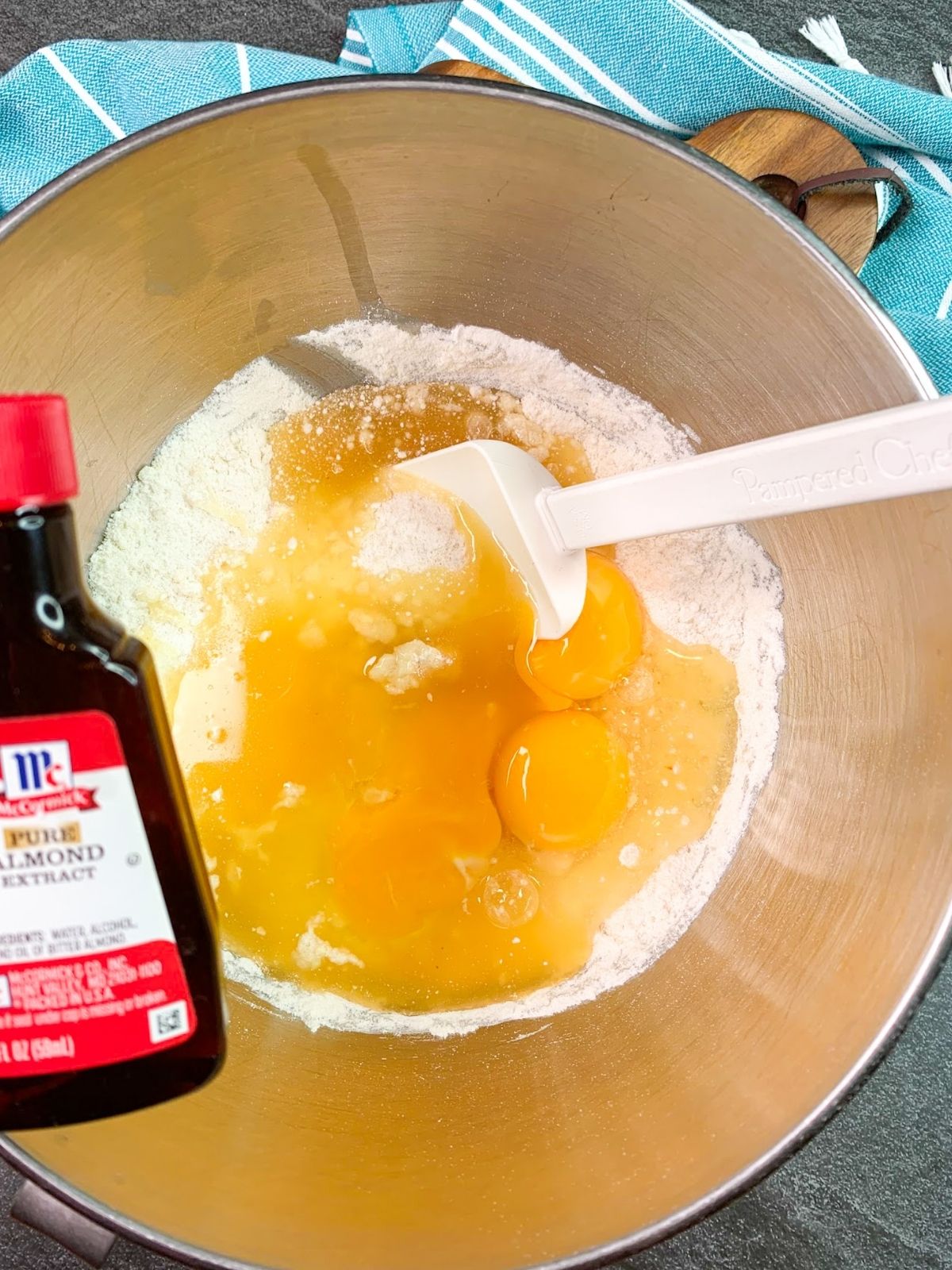 Add almond extract to cake mix batter.