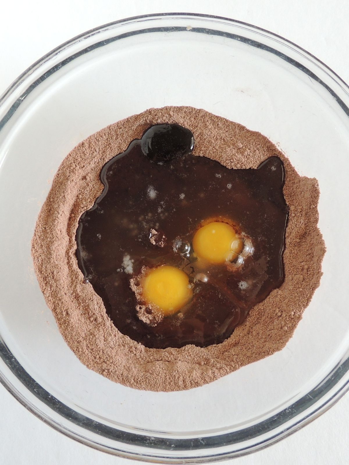 Add wet ingredients to dry brownie ingredients in bowl.