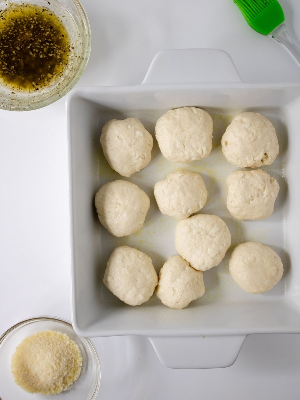 Grands biscuits rolled into balls and stuffed with cheese.