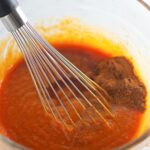 combine pumpkin puree with spices in bowl.