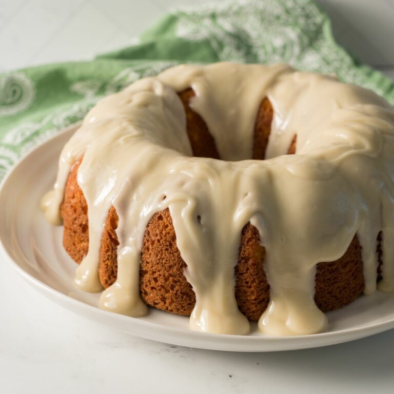 Peach Bundt Cake on white plate.