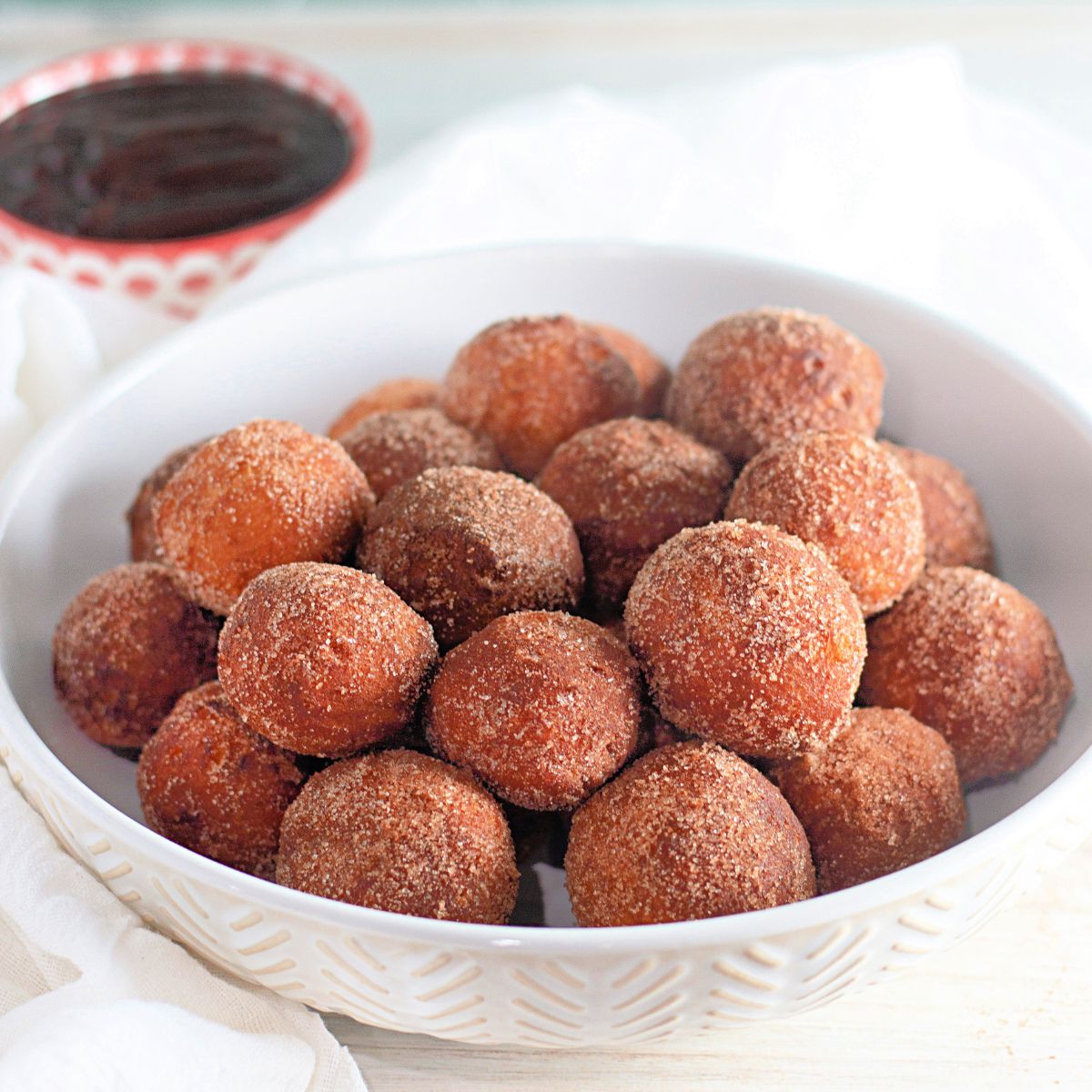 cinnamon sugar donut holes in bowl.