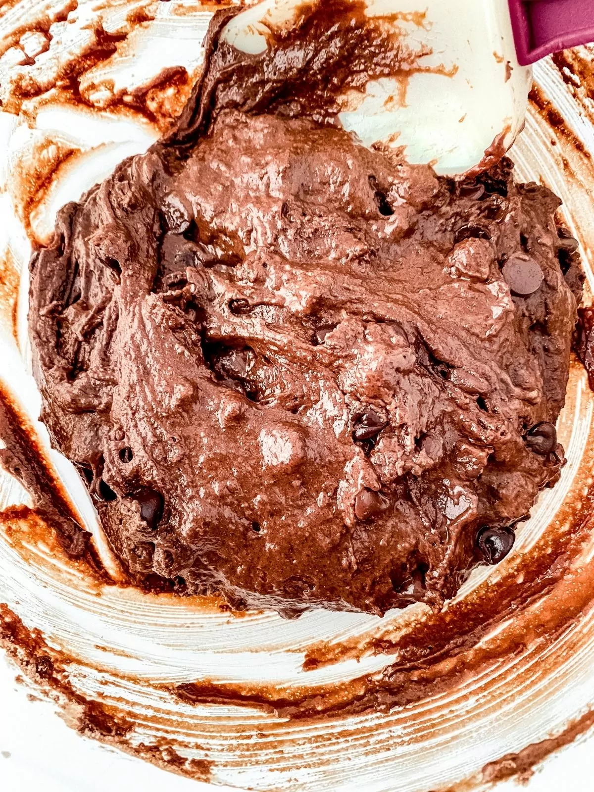 chocolate muffin batter combined in bowl.