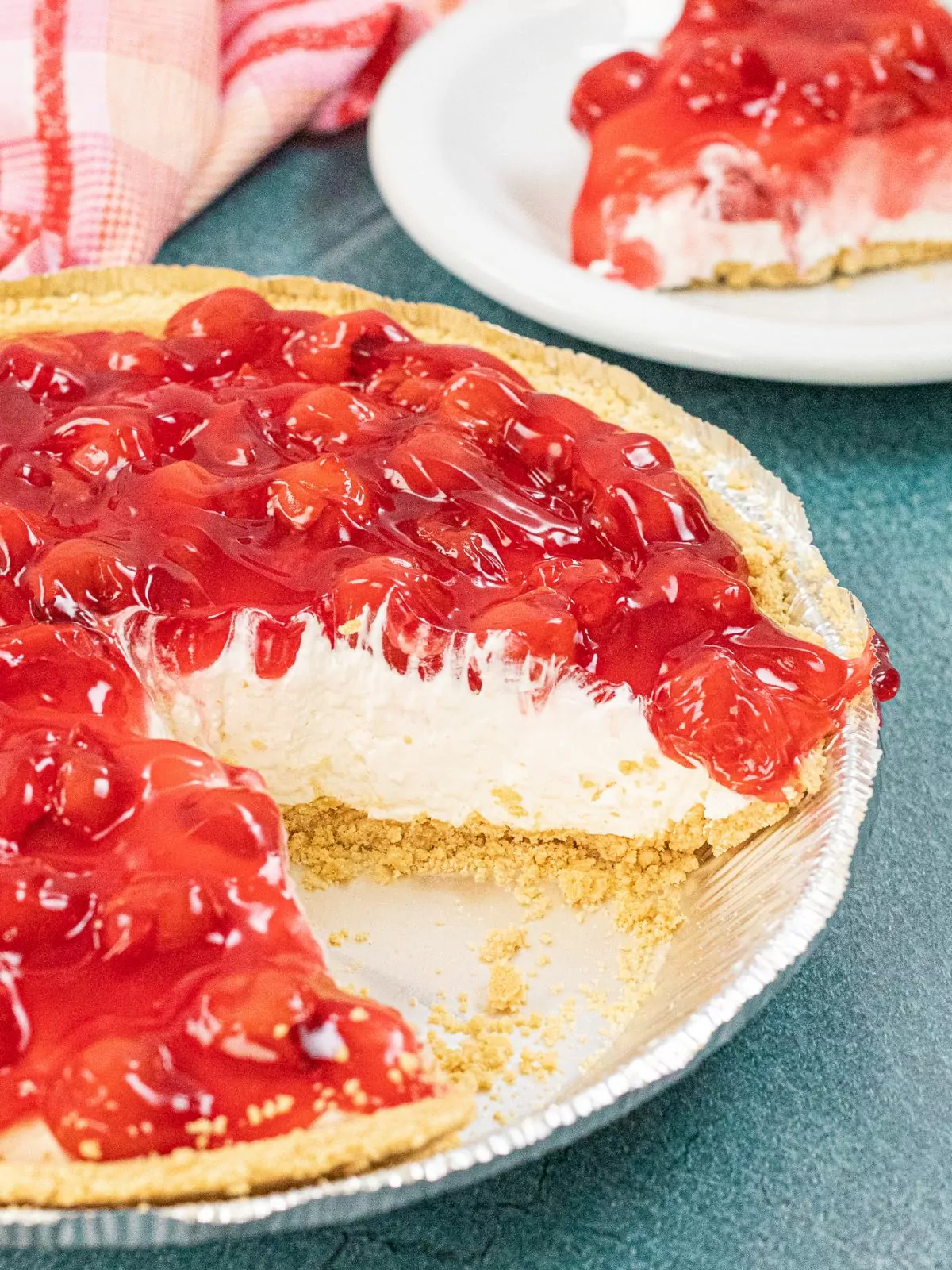 No bake cheesecake pie with piece missing.