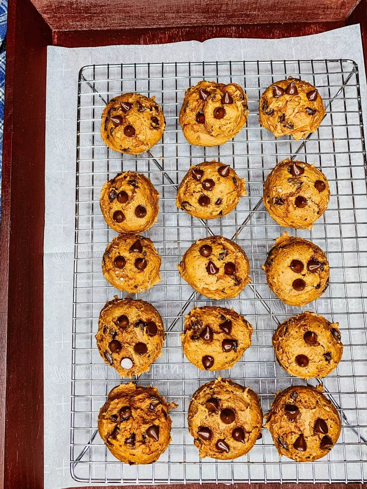 cookies made with spice cake mix and chocolate chips on cooling rack.