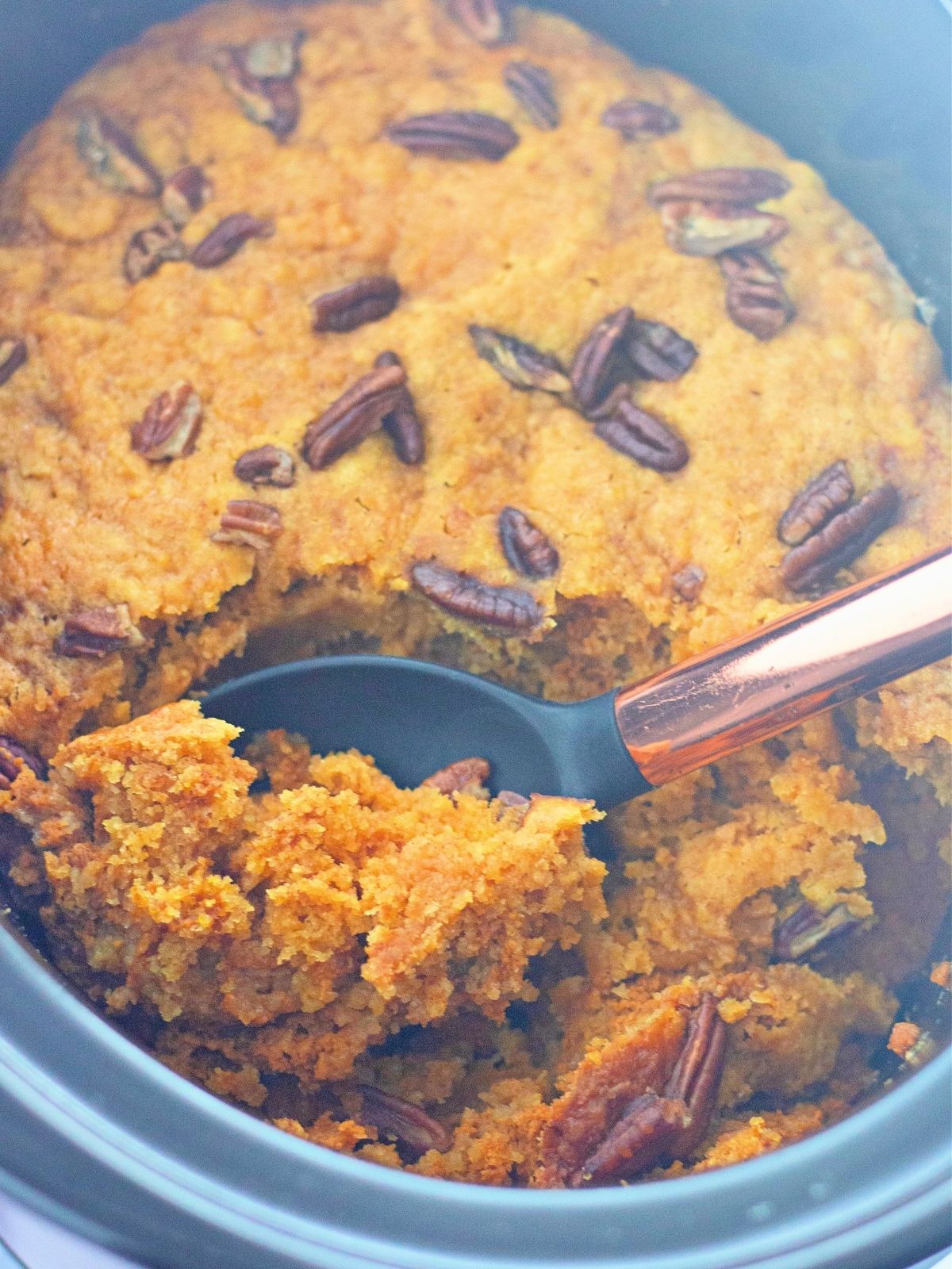 Serving pumpkin cobbler from crock pot.