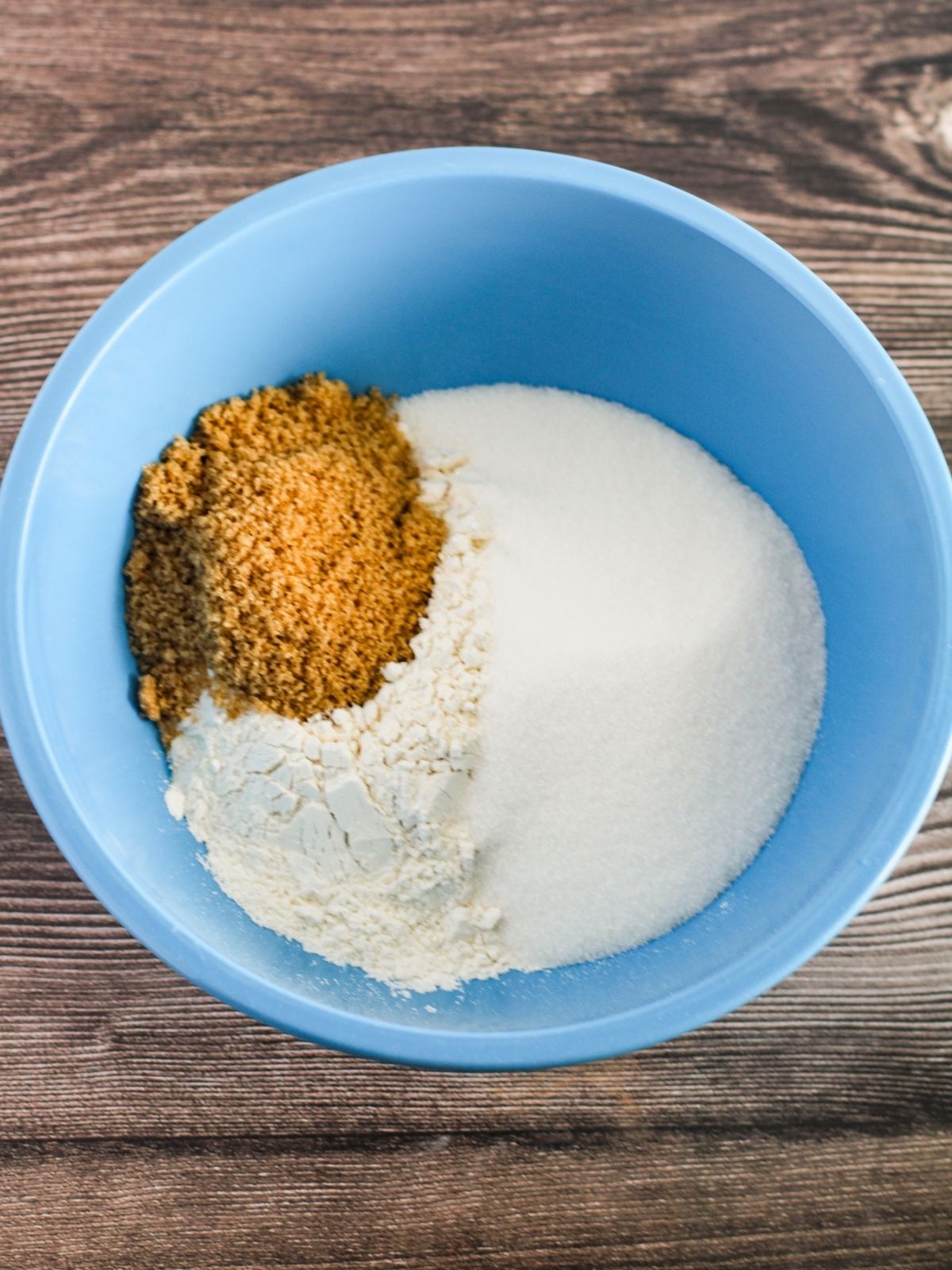 brown sugar, granulated sugar, flour in bowl.