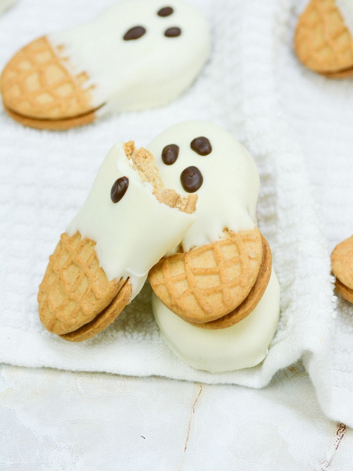 half eaten peanut butter ghost cookie.