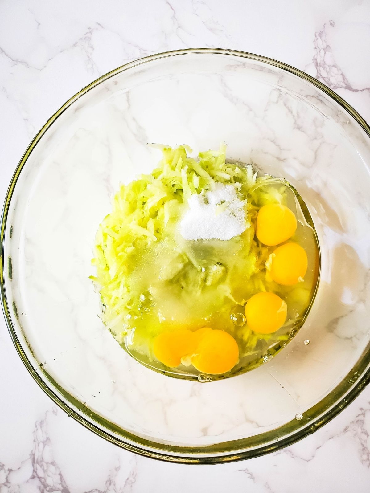 combine ingredients for zucchini bread in bowl.