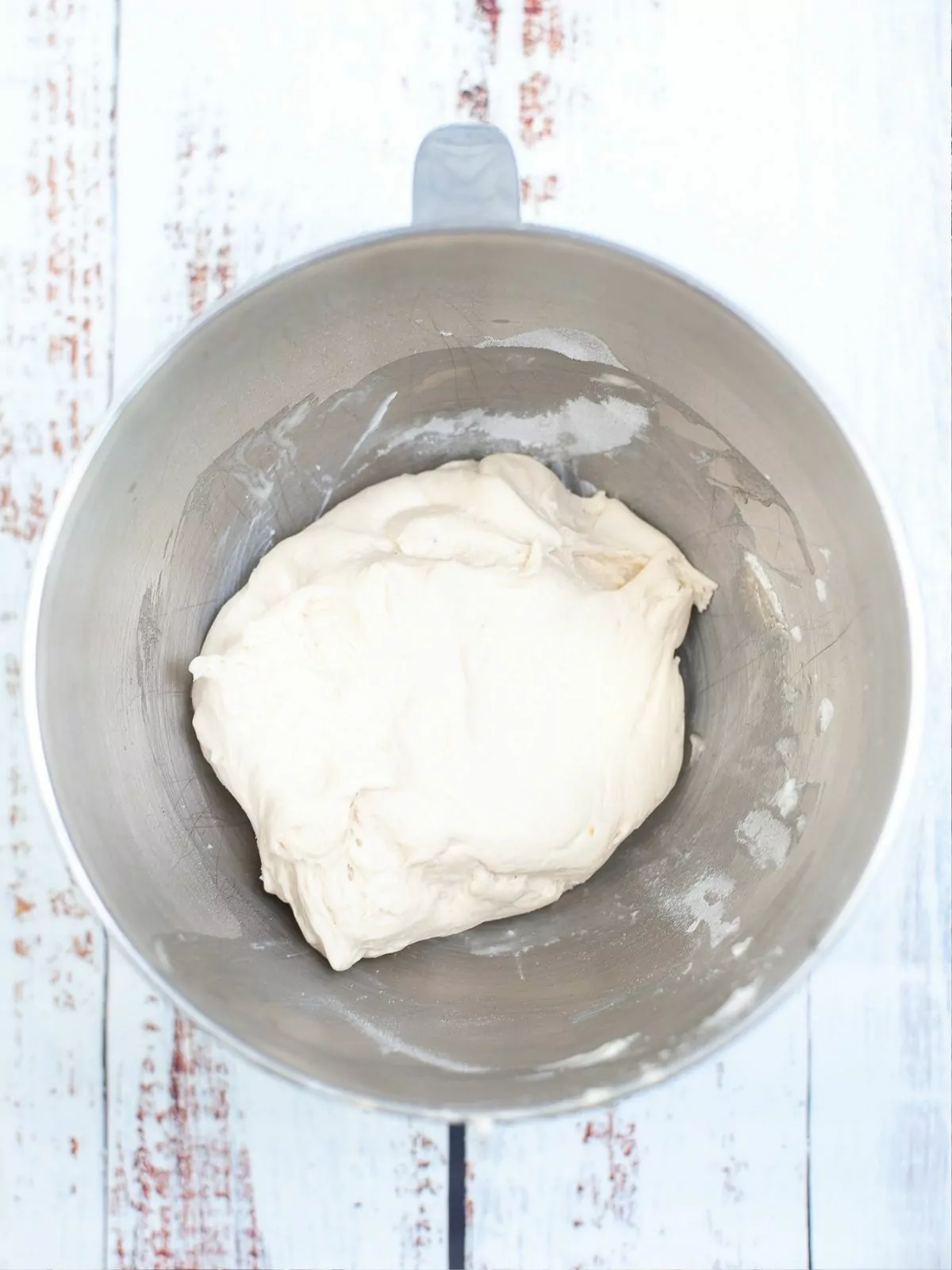 Flatbread dough combined in mixing bowl.
