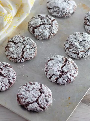 Chocolate cake mix cookies on baking tray.